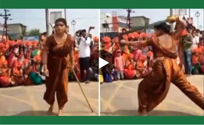 The girl showed acrobatics wearing a Nauvari sari with a swordd