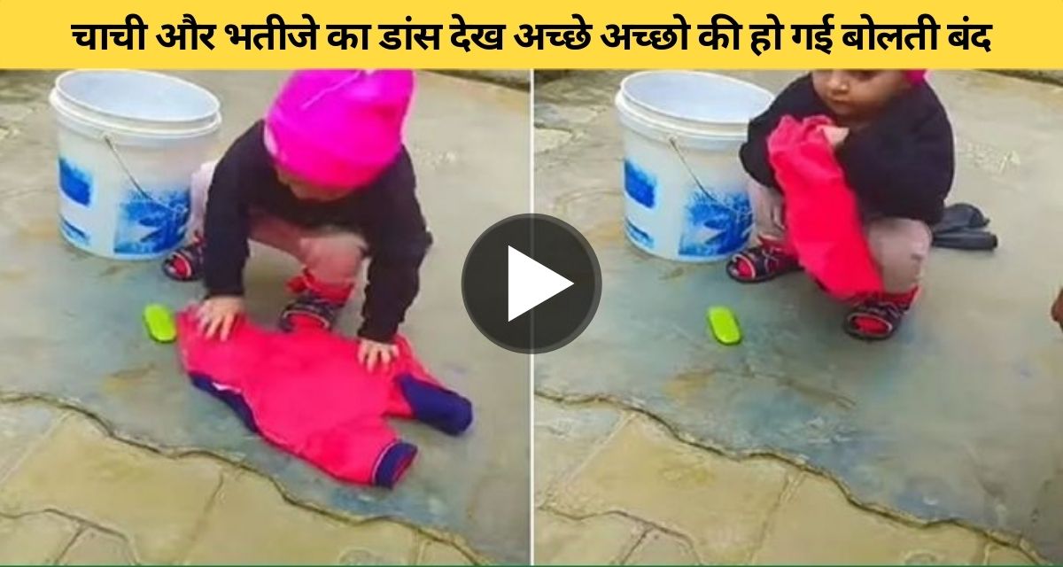 little girl washing her own clothes in winter